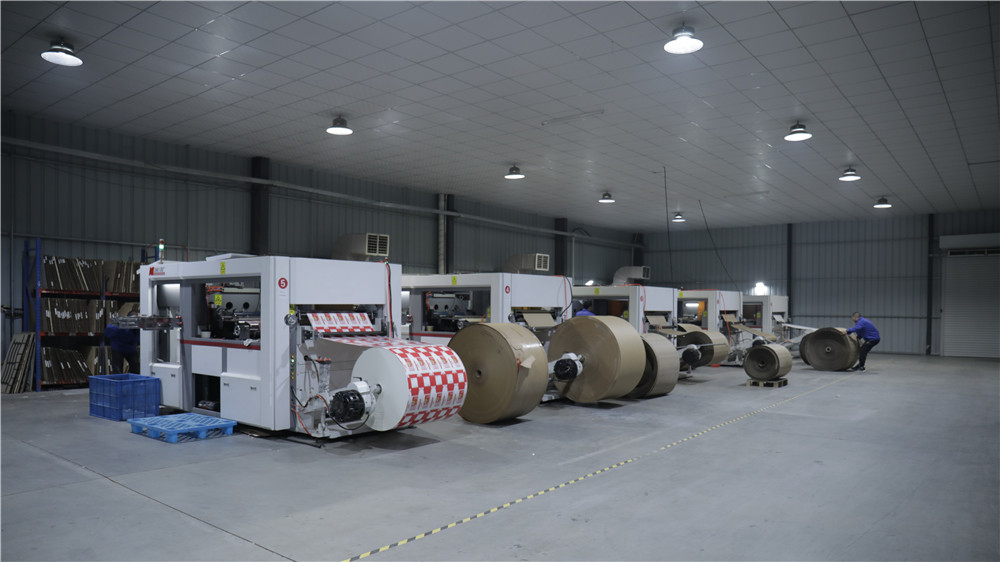 Precision cutting process for sustainable food packaging paper materials