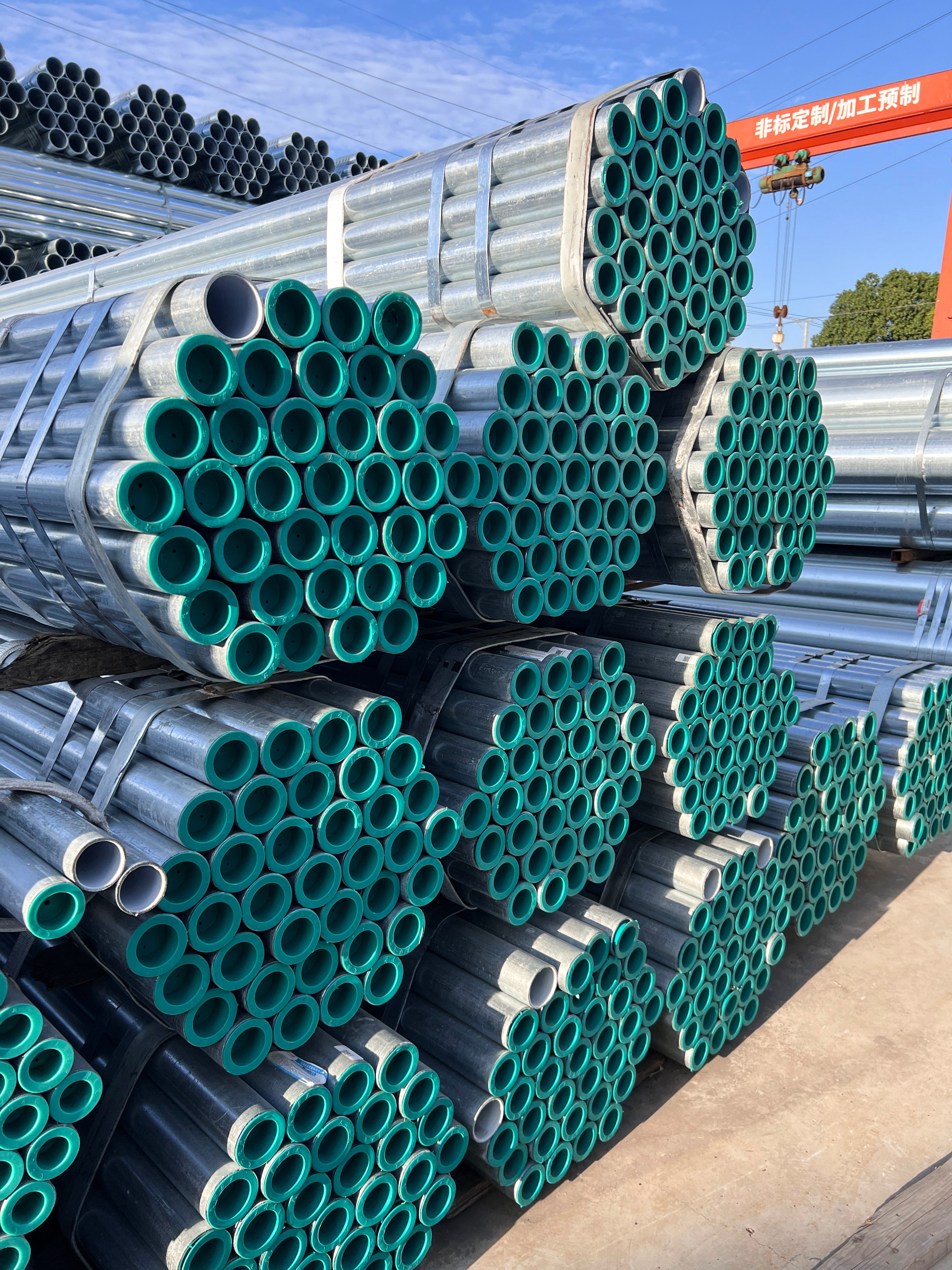Plastic-lined steel pipe