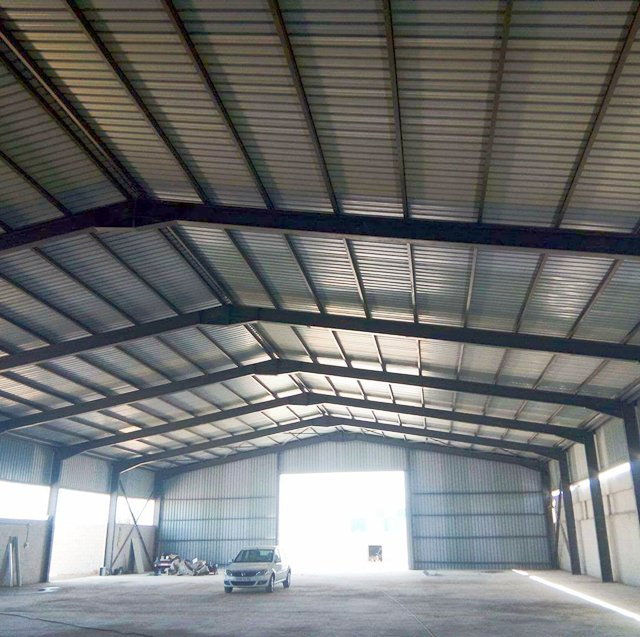 Prefab/Prefabricated Storage/Garage/Shed/Workshop/Warehouse Metal Frame Construction Steel Structure Building with Galvanized/Paint Insulation Roof