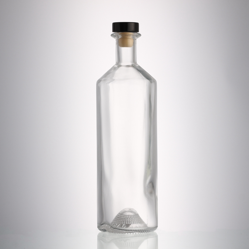 China 700 ml round liquor glass bottle with stopper cork Manufacturer, Manufacturers