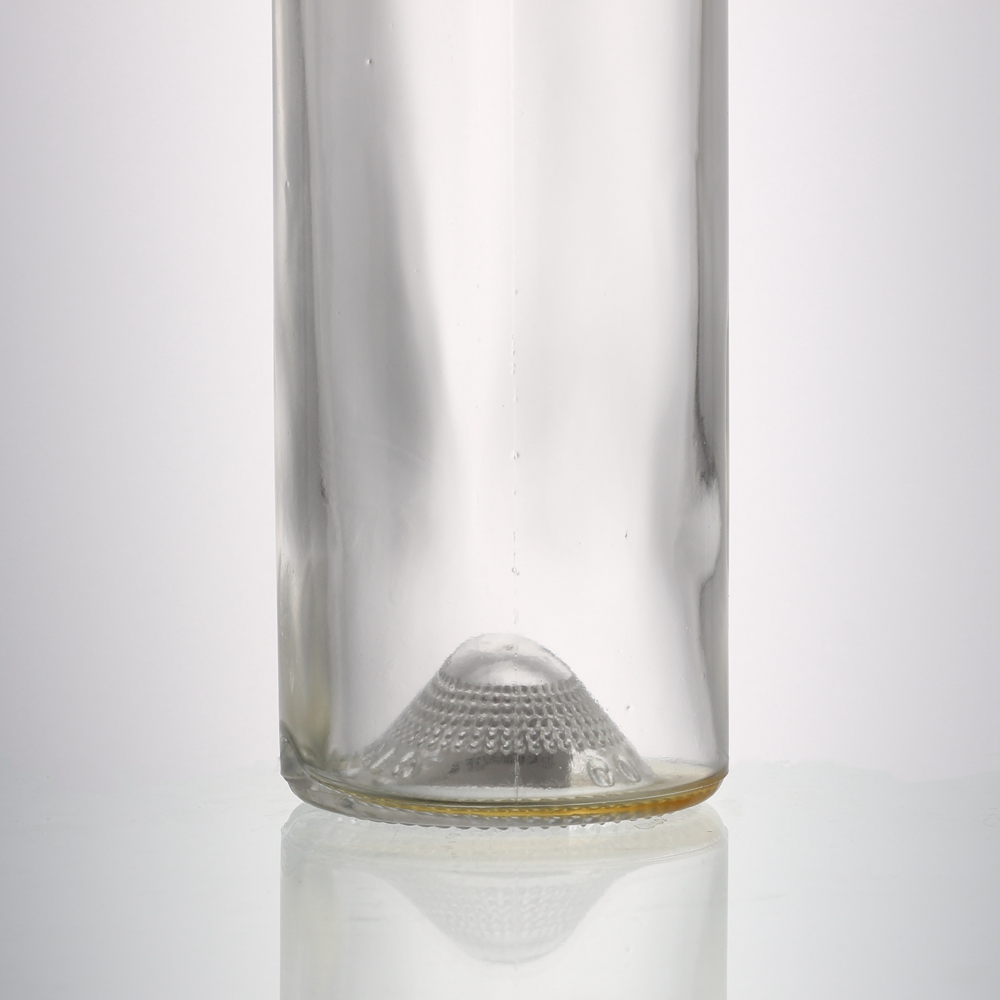 China 700 ml round liquor glass bottle with stopper cork Manufacturer, Manufacturers