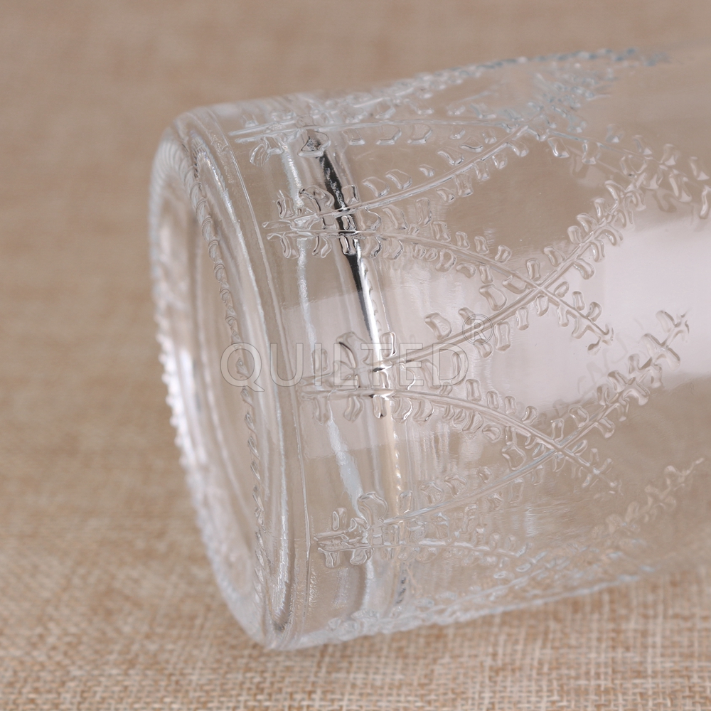 Wholesale 700ml embossed glass liquor bottle with cork  Supplier, Suppliers