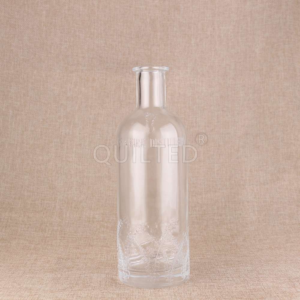Wholesale 700ml embossed glass liquor bottle with cork  Supplier, Suppliers