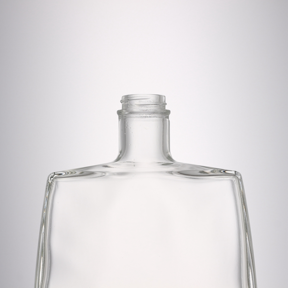 China unique clear glass 700 ml flat shape liquor bottle  Manufacturers, Suppliers