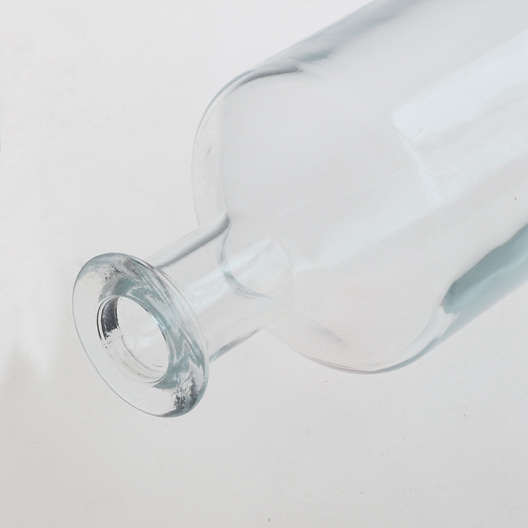 Wholesale 700ml Clear Round Shape Liquor Glass Bottle Manufacturer, Manufacturers