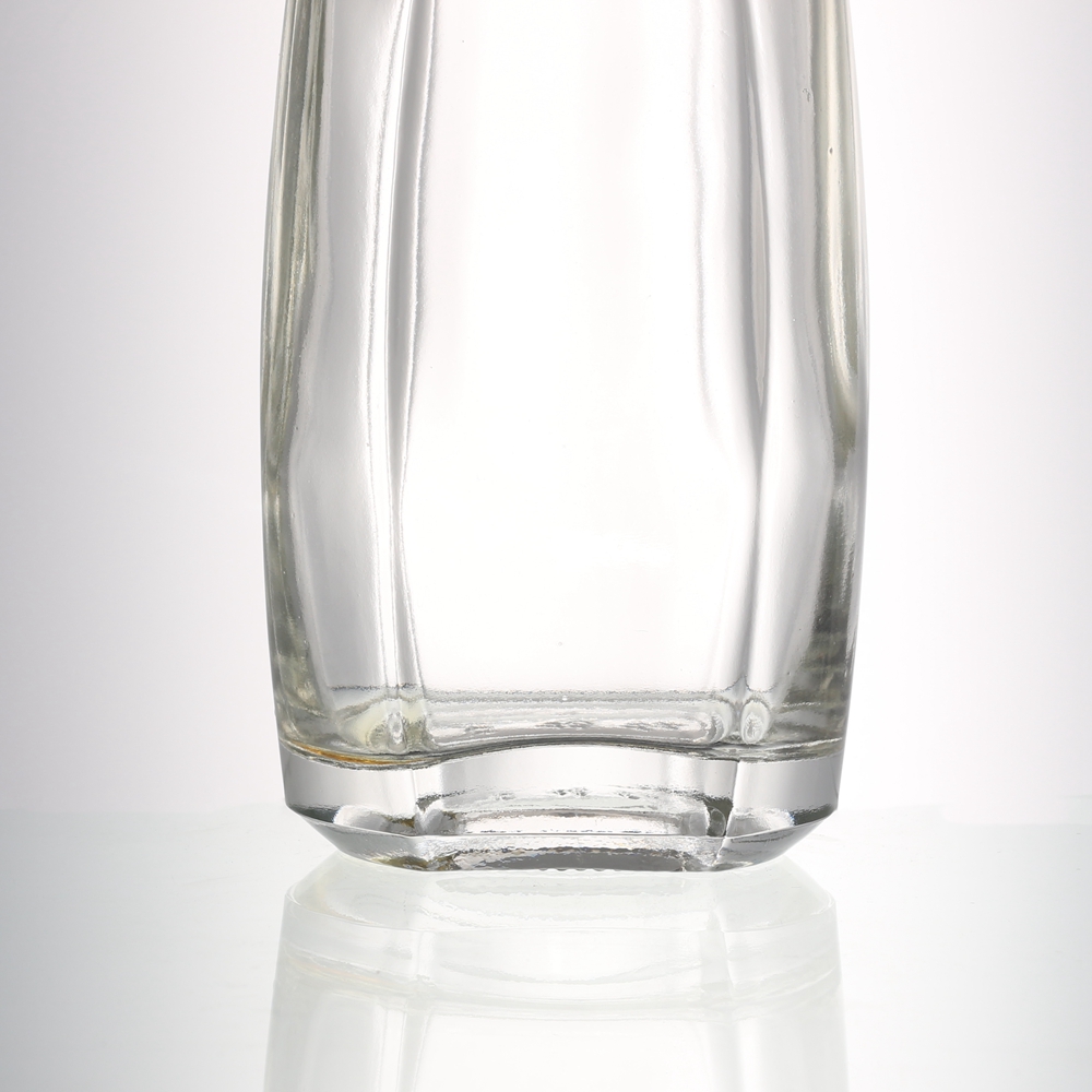 China 1000 ml flat round long neck liquor glass bottle  Manufacturers, Supplier