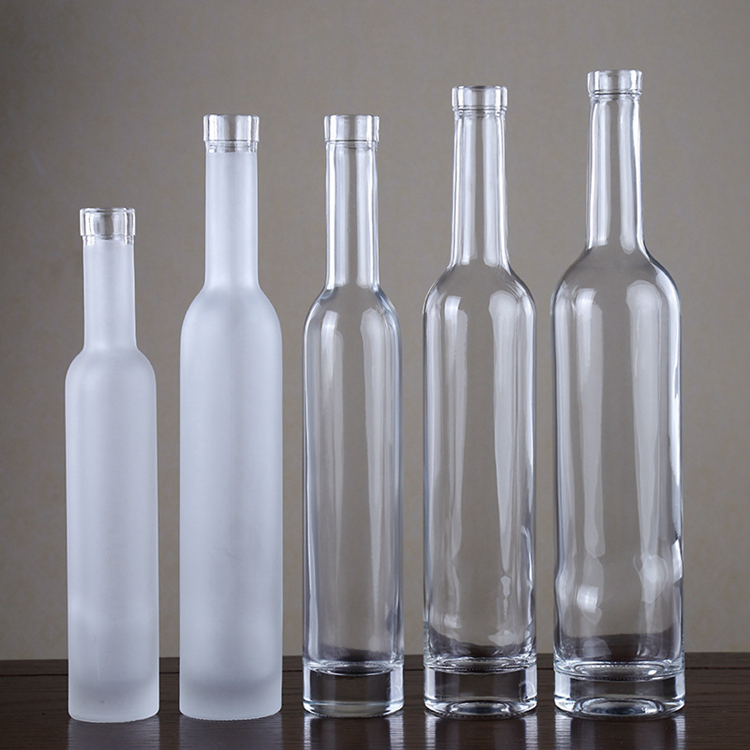 China Bulk 200 ml thin clear liquor glass bottle with lid  Manufacturer, Manufacturers