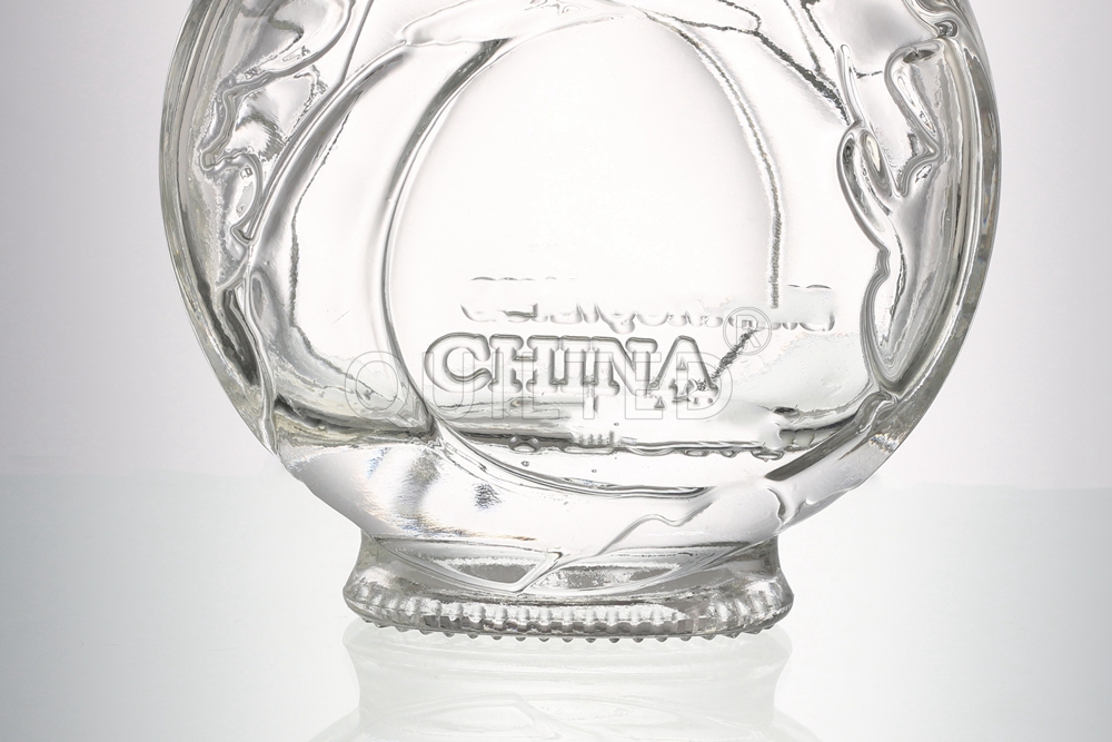 Wholesale 300 ml embossed glass bottle for whisky and liquor with lid  Manufacturers, Suppliers