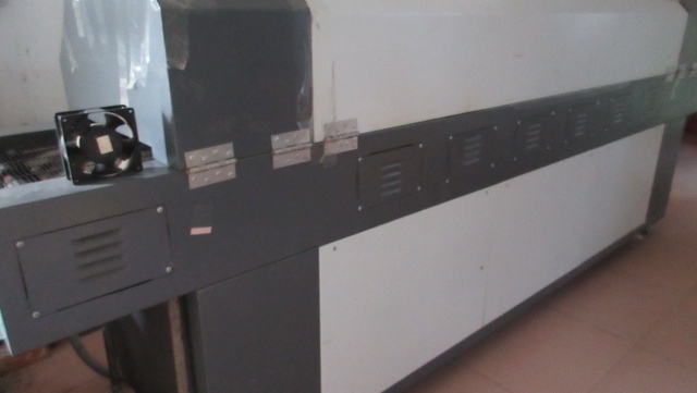 Reflow soldering machine for LED circuit board manufacturing at Quack Lamp