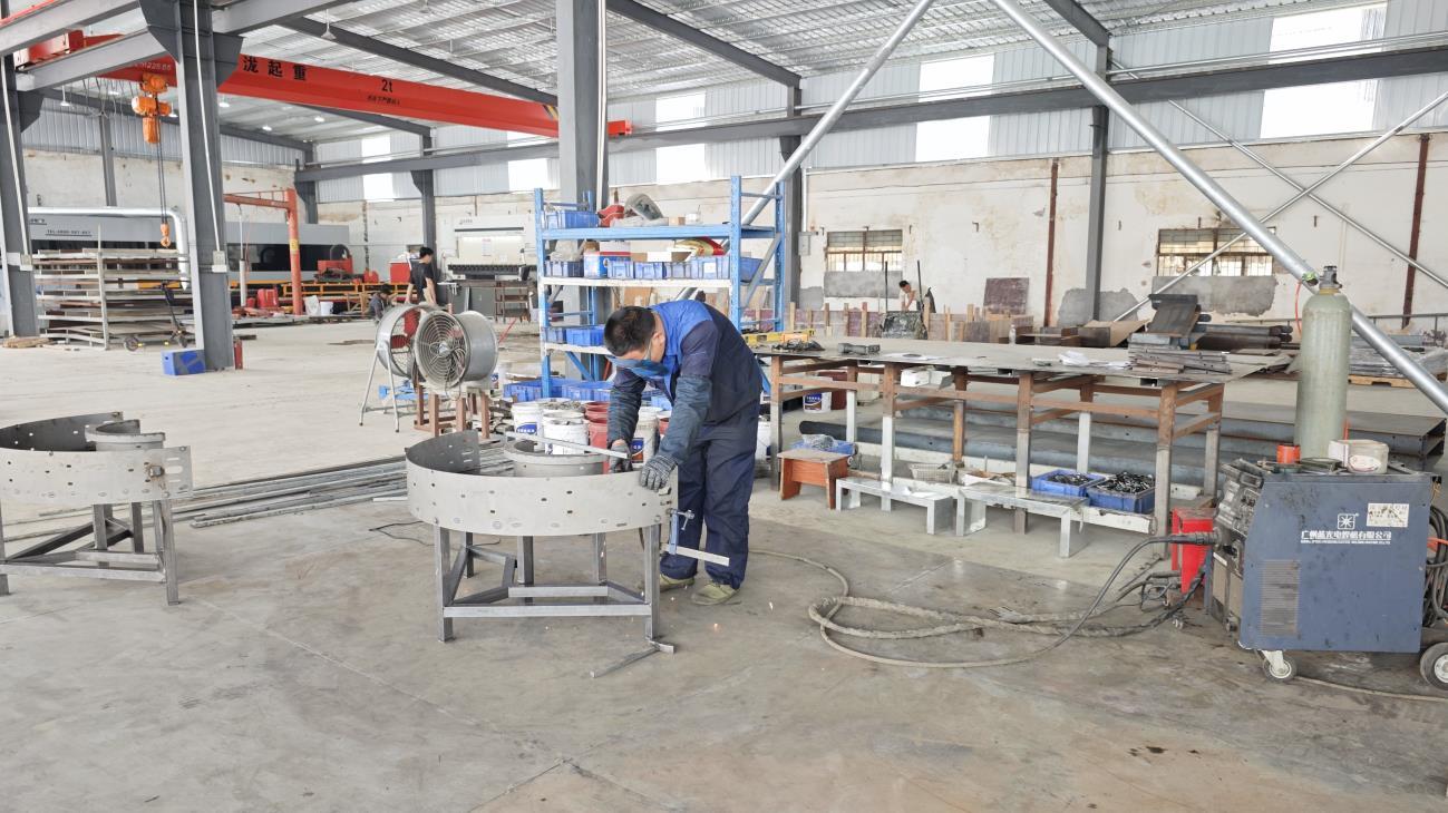 MIG welding of steel warehouse shelving and AS/RS system frames