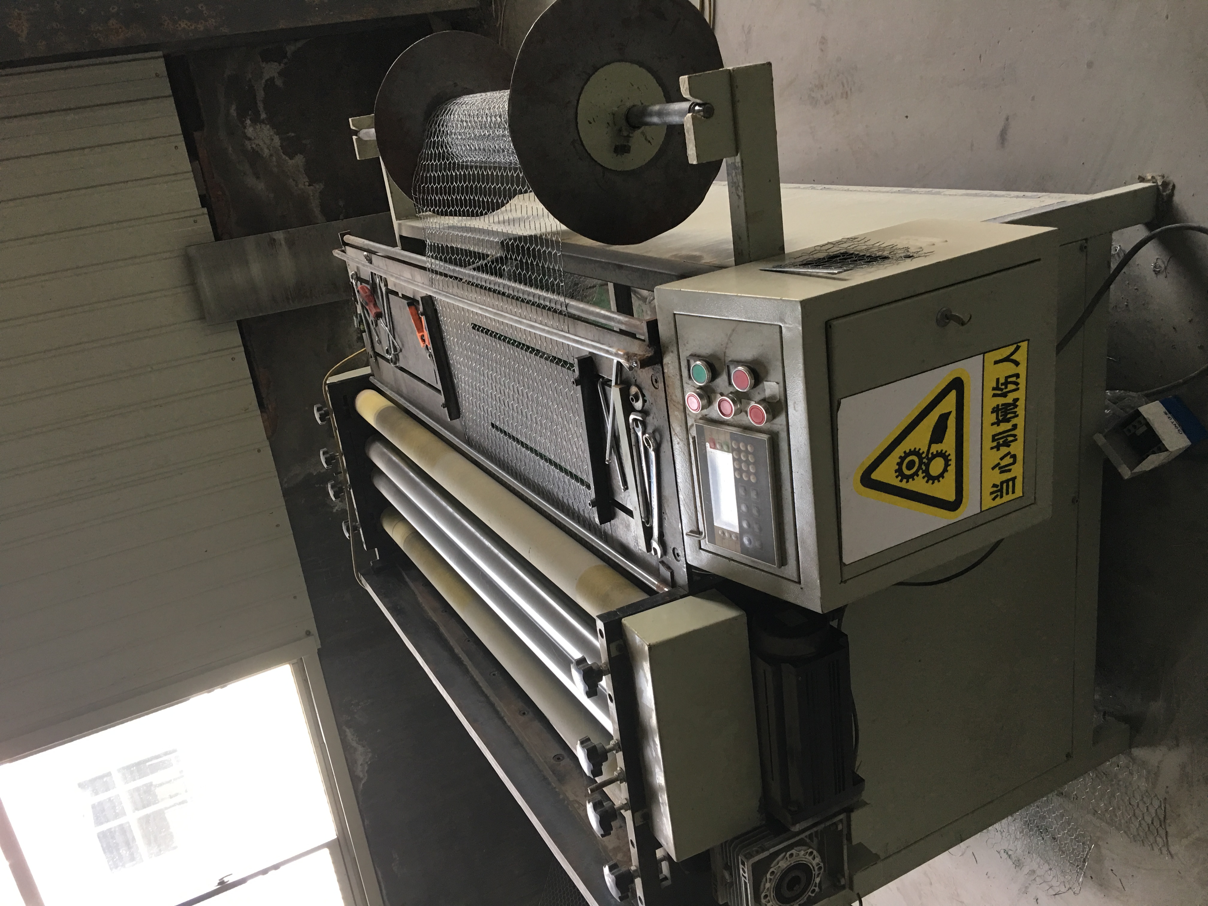 Numerical Control Leveling and Cutting Mesh Machine