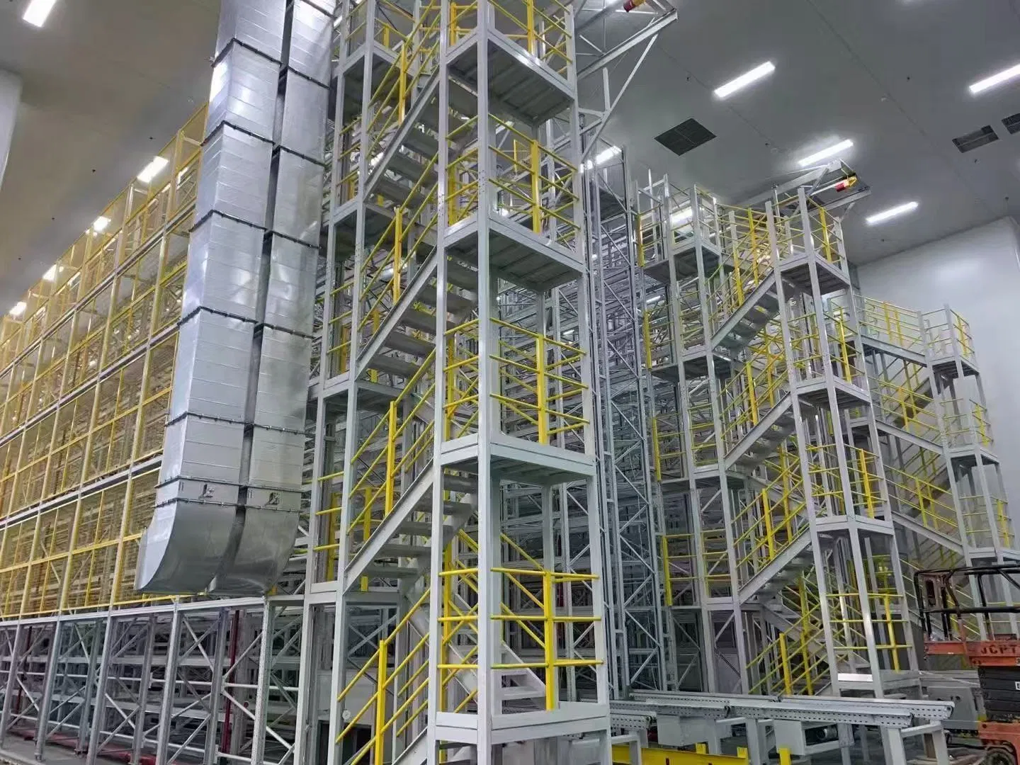Stacker Crane and Conveyor Line Integrated Into Pallet Racking System