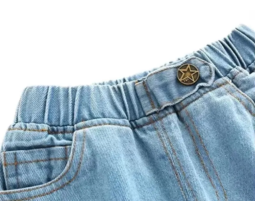 Venda por atacado de calças jeans retas lisas e coloridas para meninos