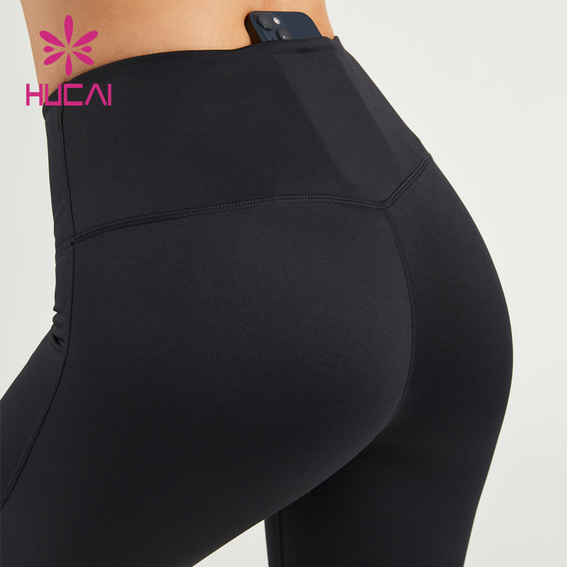 Calças de esqui femininas personalizadas em tecido impermeável Hucai ODM com flare