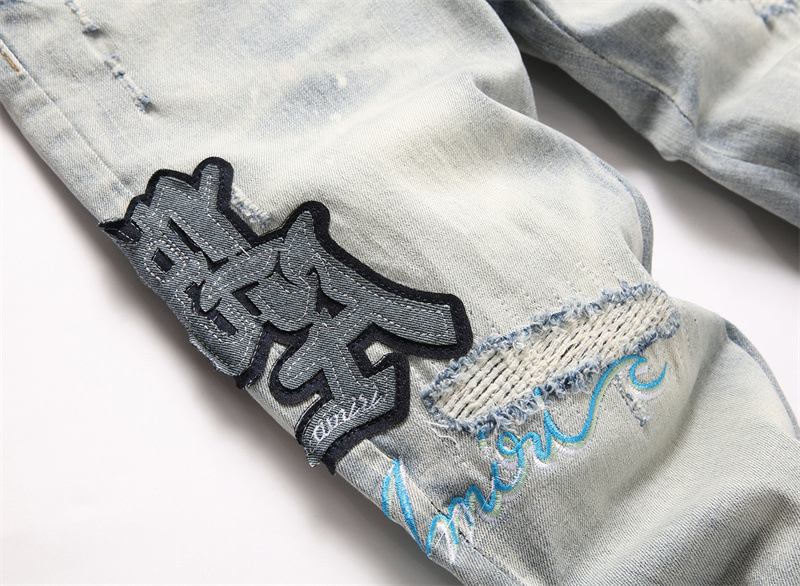 Fábrica Atacado Personalizado Logotipo de Marca Alta Qualidade Am Rasgado Azul Estrela Patches Ajuste Slim Jeans Skinny Masculinos Tendência