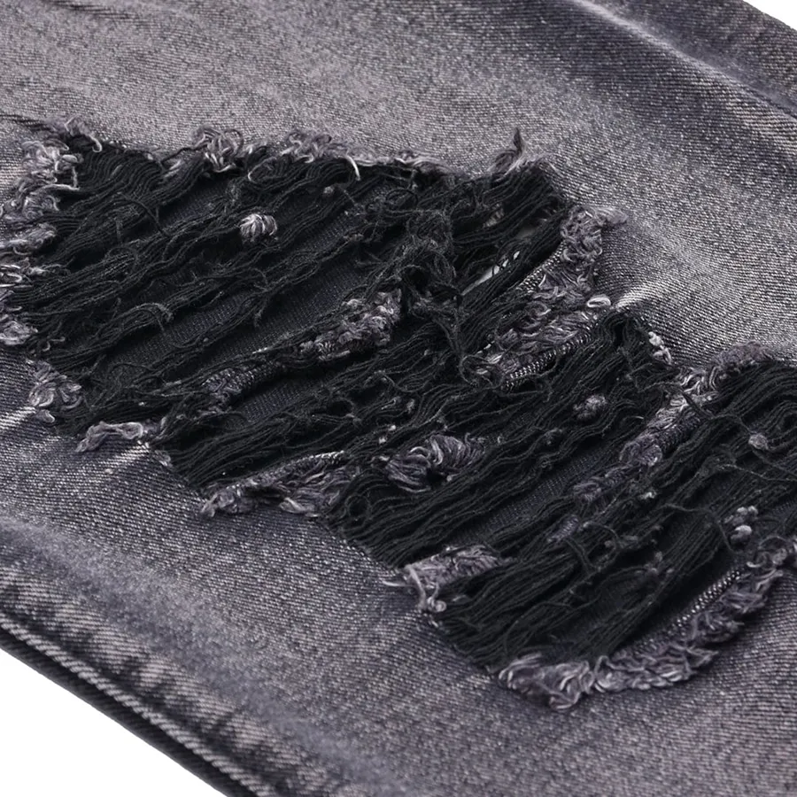 Detalhe das calças jeans masculinas