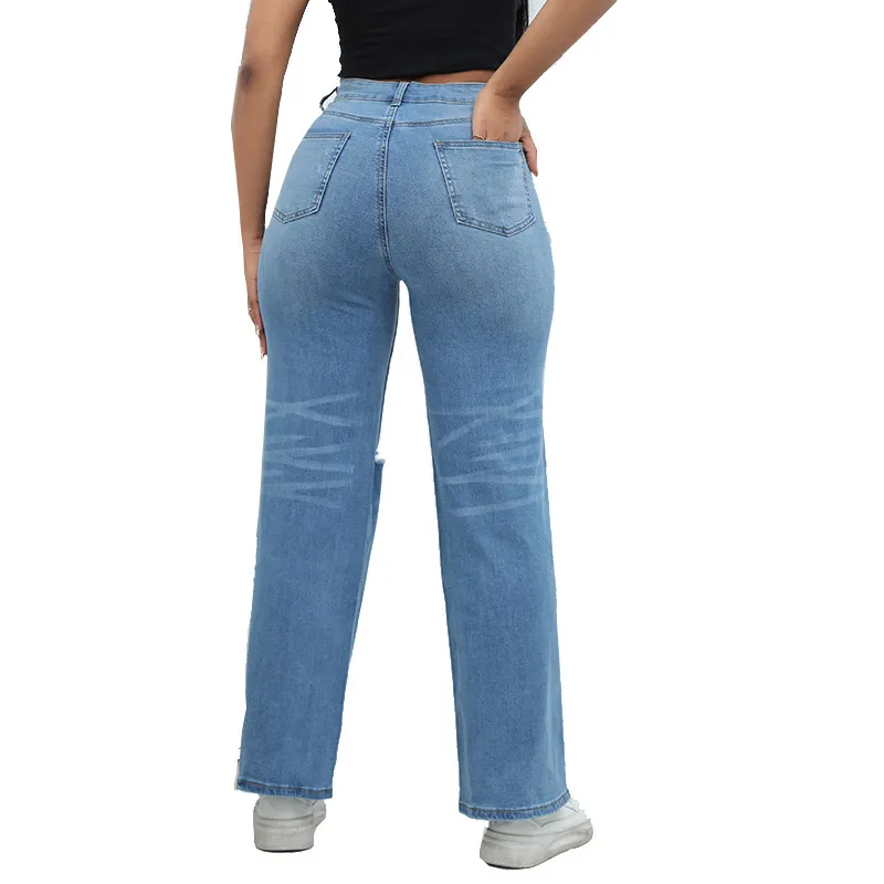 Calças de jeans largas rasgadas de moda casual femininas personalizadas por atacado em denim lavado