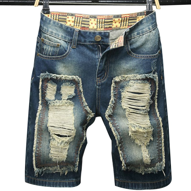 Um par de calças jeans masculinas soltas de perna reta com design individualista e de moda tendência