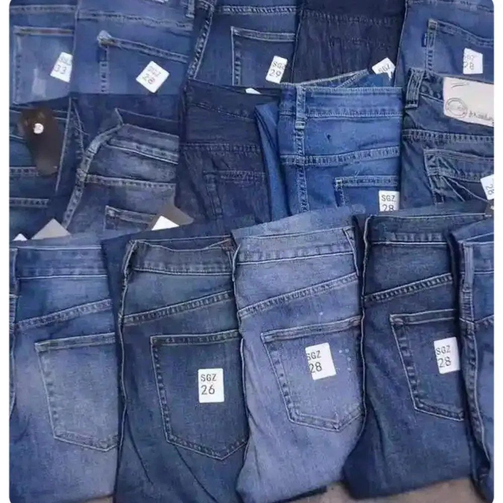 Pantalonas de moda femininas justas de algodão denim elástico a preços baixos por atacado e jeans masculinos de fábricas chinesas
