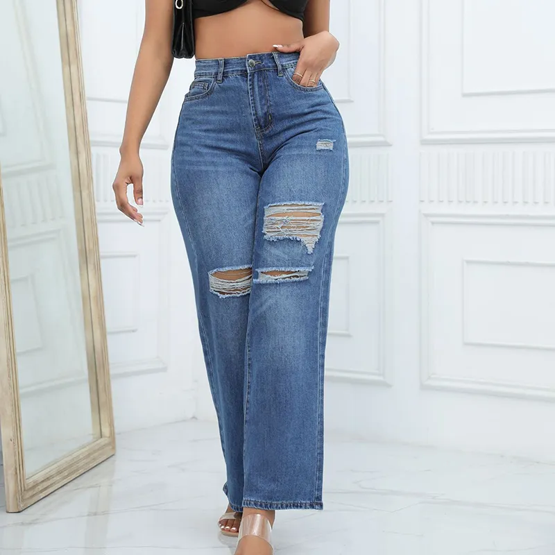 Calças de jeans largas rasgadas de moda casual femininas personalizadas por atacado em denim lavado