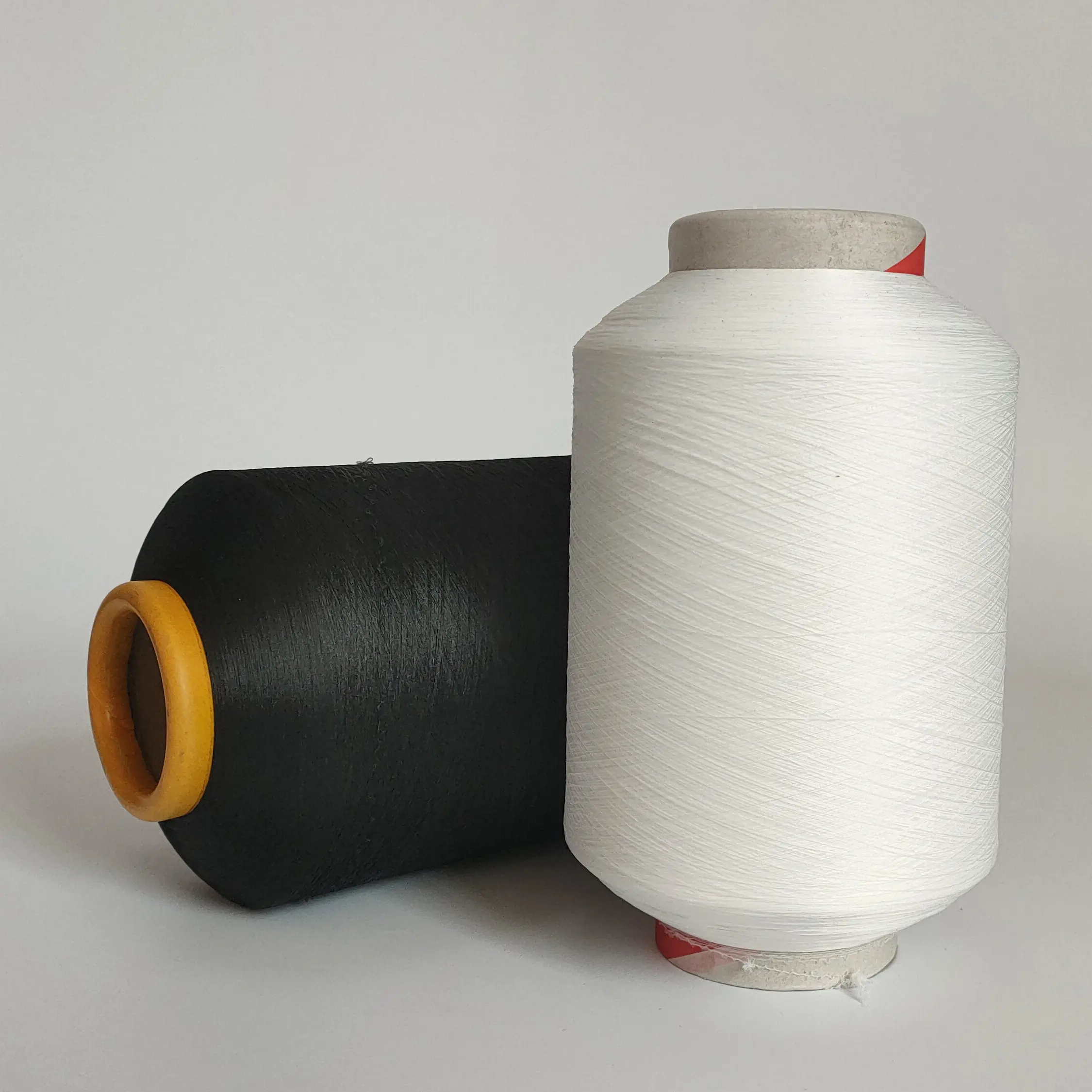 China Good Quality Low Price Custom Polyester Spandex Covered Yarn Supplier For Knitting Suppliers, Company