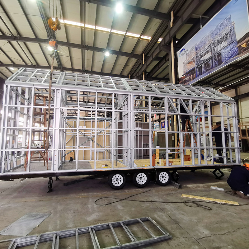Au/EU/USA Standard Prefabricated Modular House Light Steel Structure Tiny House on Wheels with Trailer