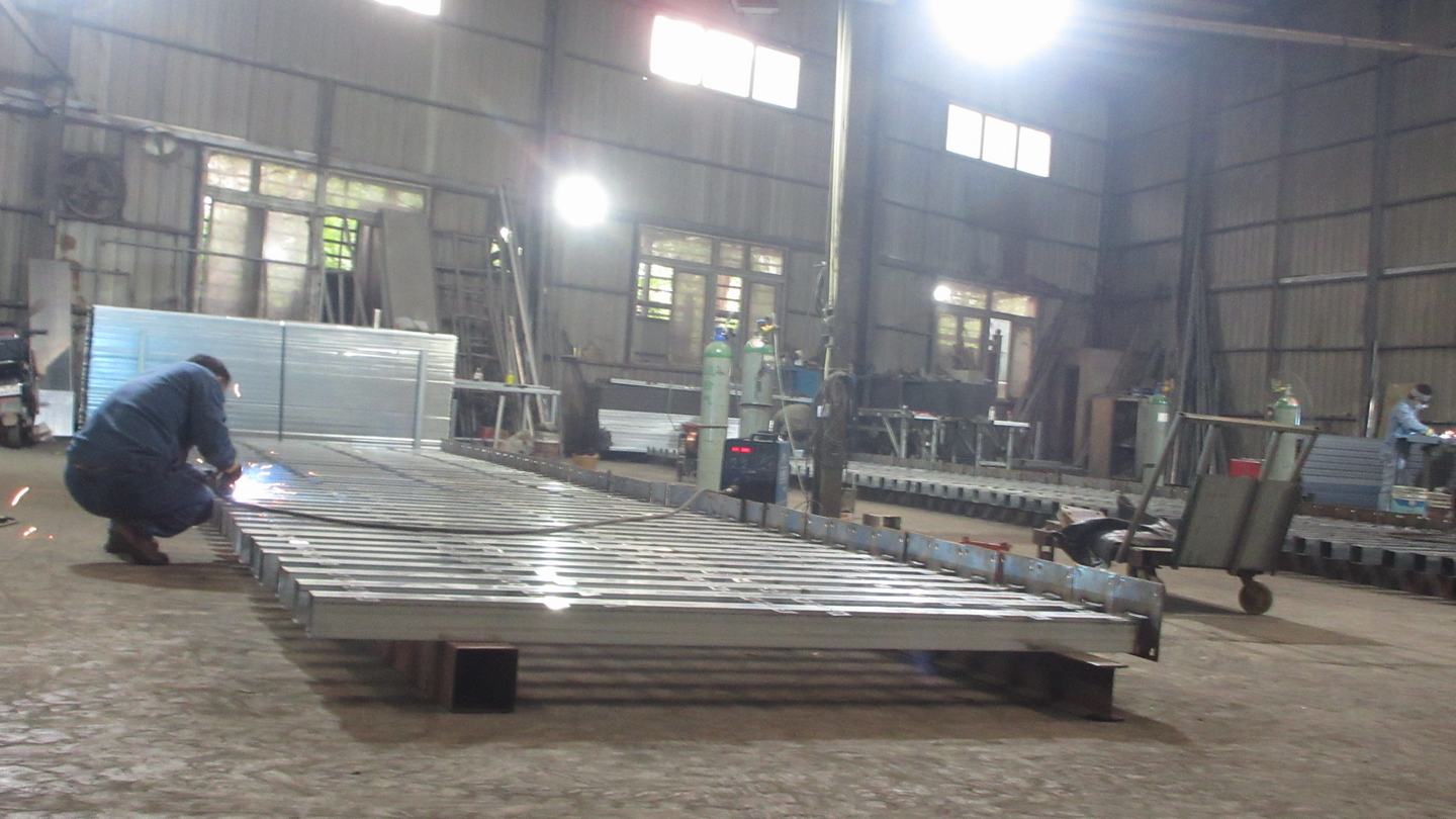 Step 3: Professional welding of steel frame components