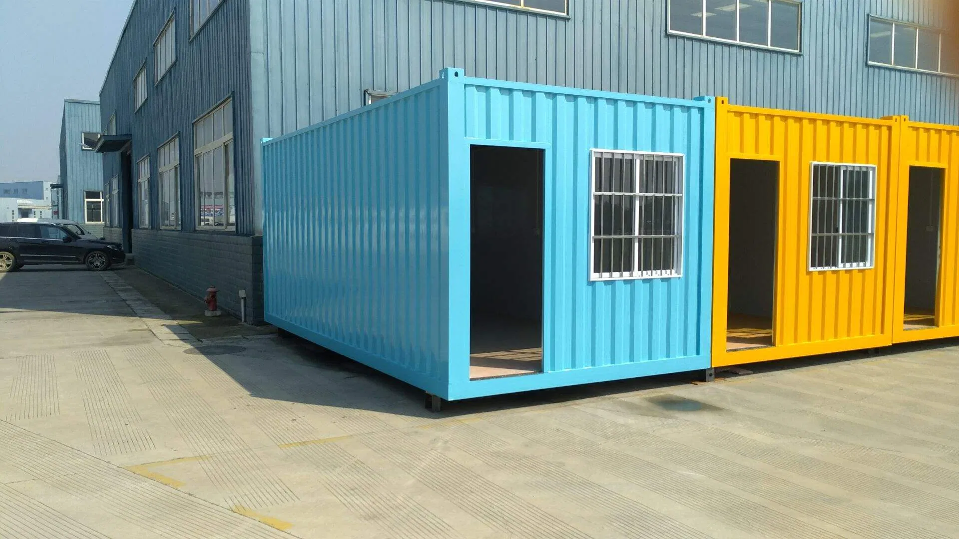 Galvanized Steel Portable Cabins with Glass Windows and Orange Interior