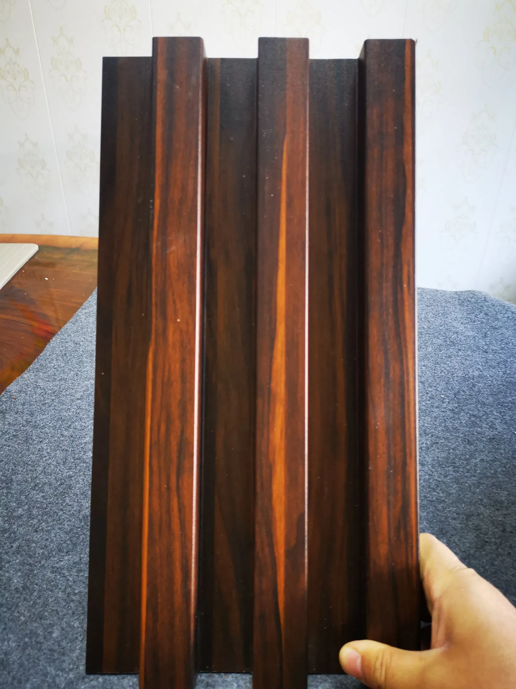 Wholesale Interior Decorative Baboo Charcoal Wood Veneer WPC Slat Paneling Fluted Wall Cladding Integrated PVC Wooden Louver Panel