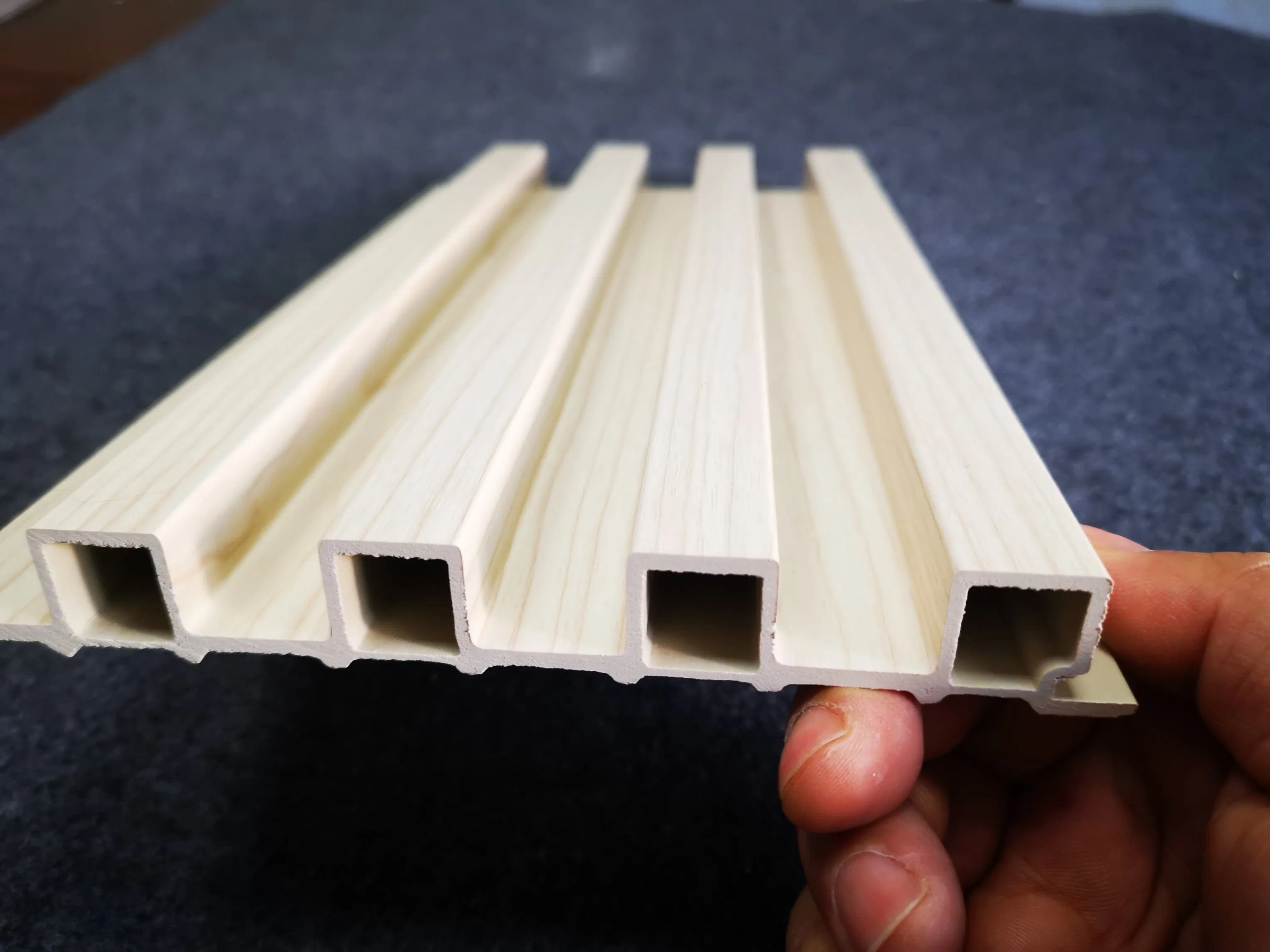 Wholesale Interior Decorative Baboo Charcoal Wood Veneer WPC Slat Paneling Fluted Wall Cladding Integrated PVC Wooden Louver Panel