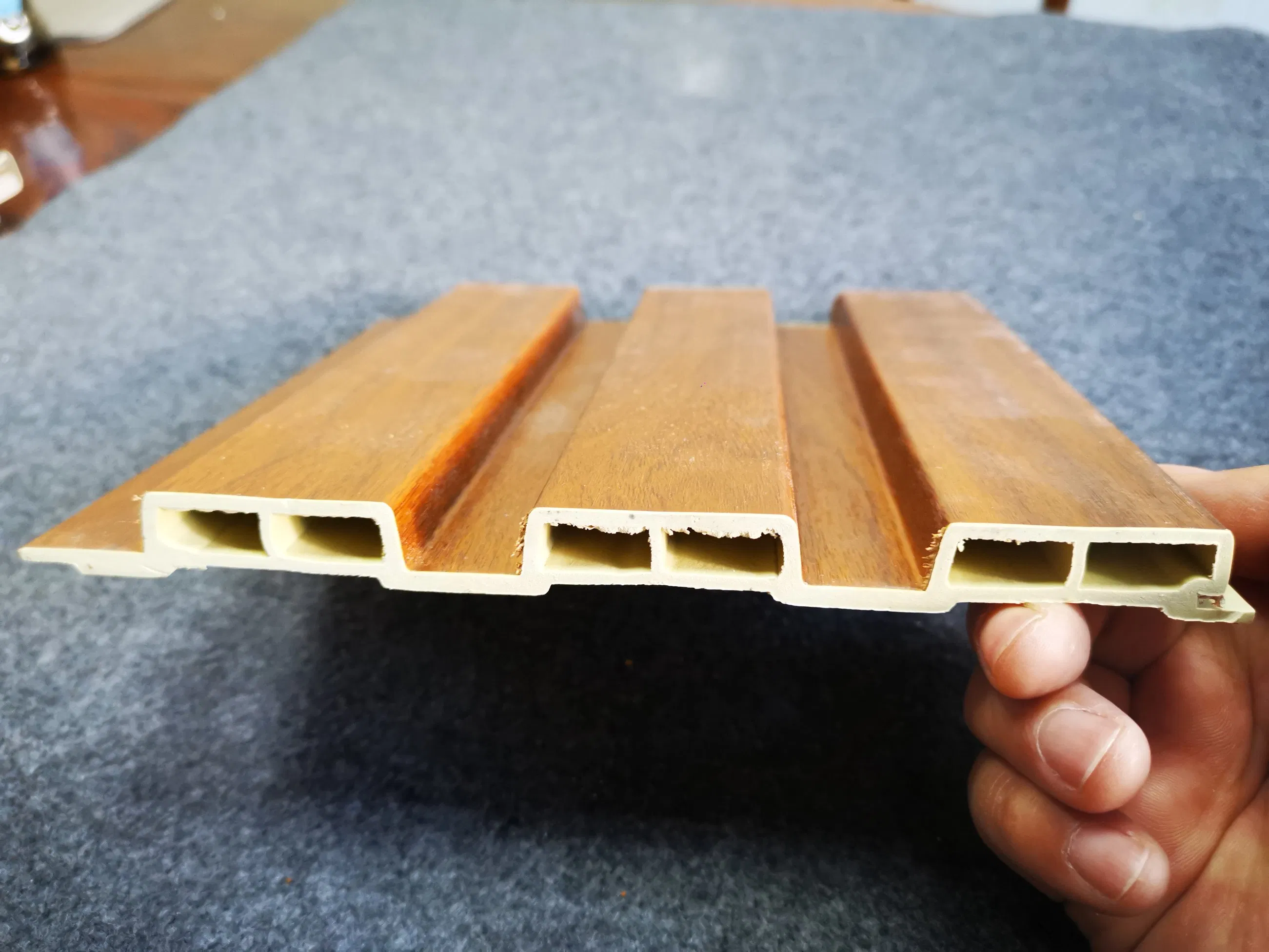 Wholesale Interior Decorative Baboo Charcoal Wood Veneer WPC Slat Paneling Fluted Wall Cladding Integrated PVC Wooden Louver Panel