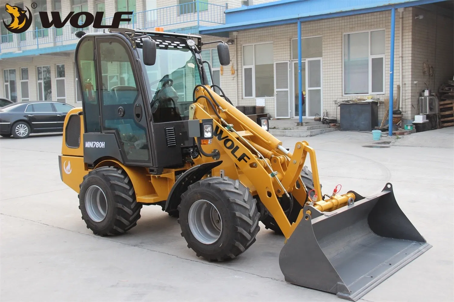 Wolf Compact/Articulated/Multifunctional with CE/Kubota/Yanmar Engine Bucket/Fork/Attachments/Cab 780h Front End Mini Loader Price for Sales/Garden/Wheel Horse