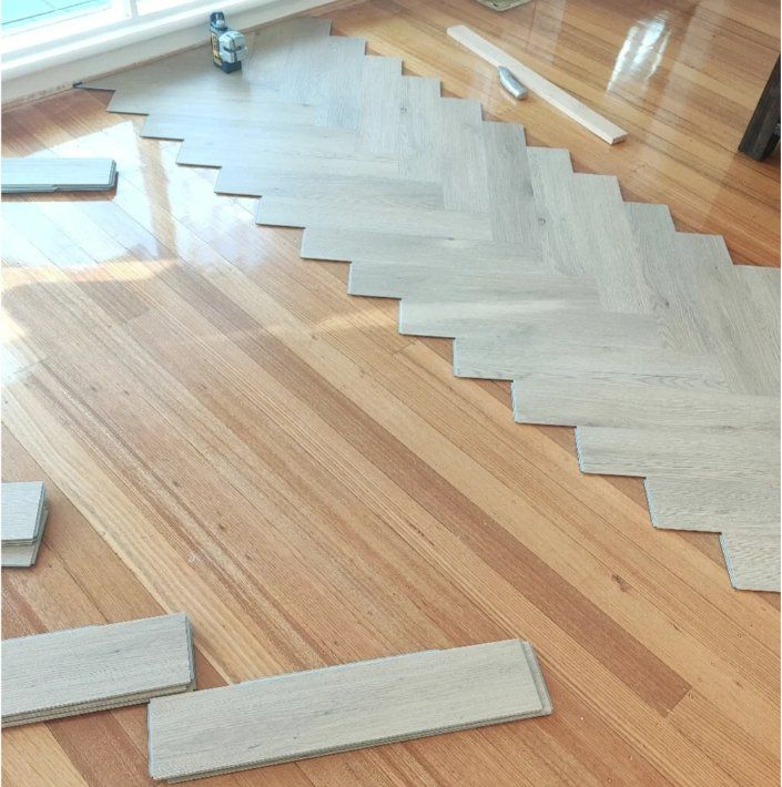 China Factory OEM/ODF Various Herringbone Floor Tiles AC3 AC4 Wear-Resistant Big Wood Floor Tiles HDF MDF Laminate Flooring Covering