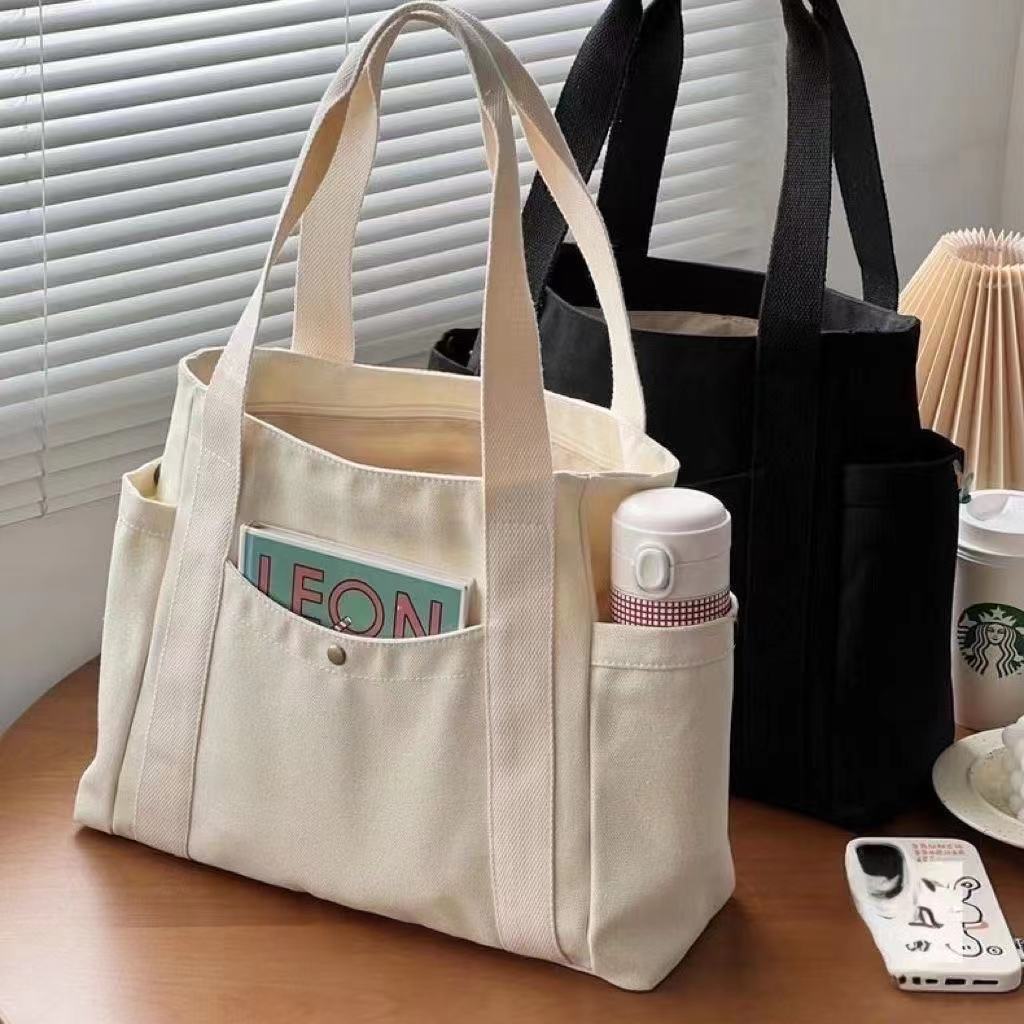 Hot Selling Factory Outdoor Travel Multi-pockets Soft Handbag Tote Bag Custom Logo Cotton Canvas Messenger Shoulder Carrier Bag