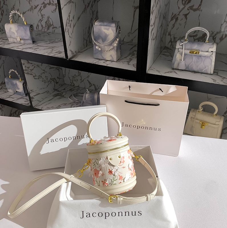 It's a Women's Crossbody Bag, a 2025 New Model Leather Retro Handbag, a Lucky Money Bucket Shoulder Bag and a Water Bucket Bag.