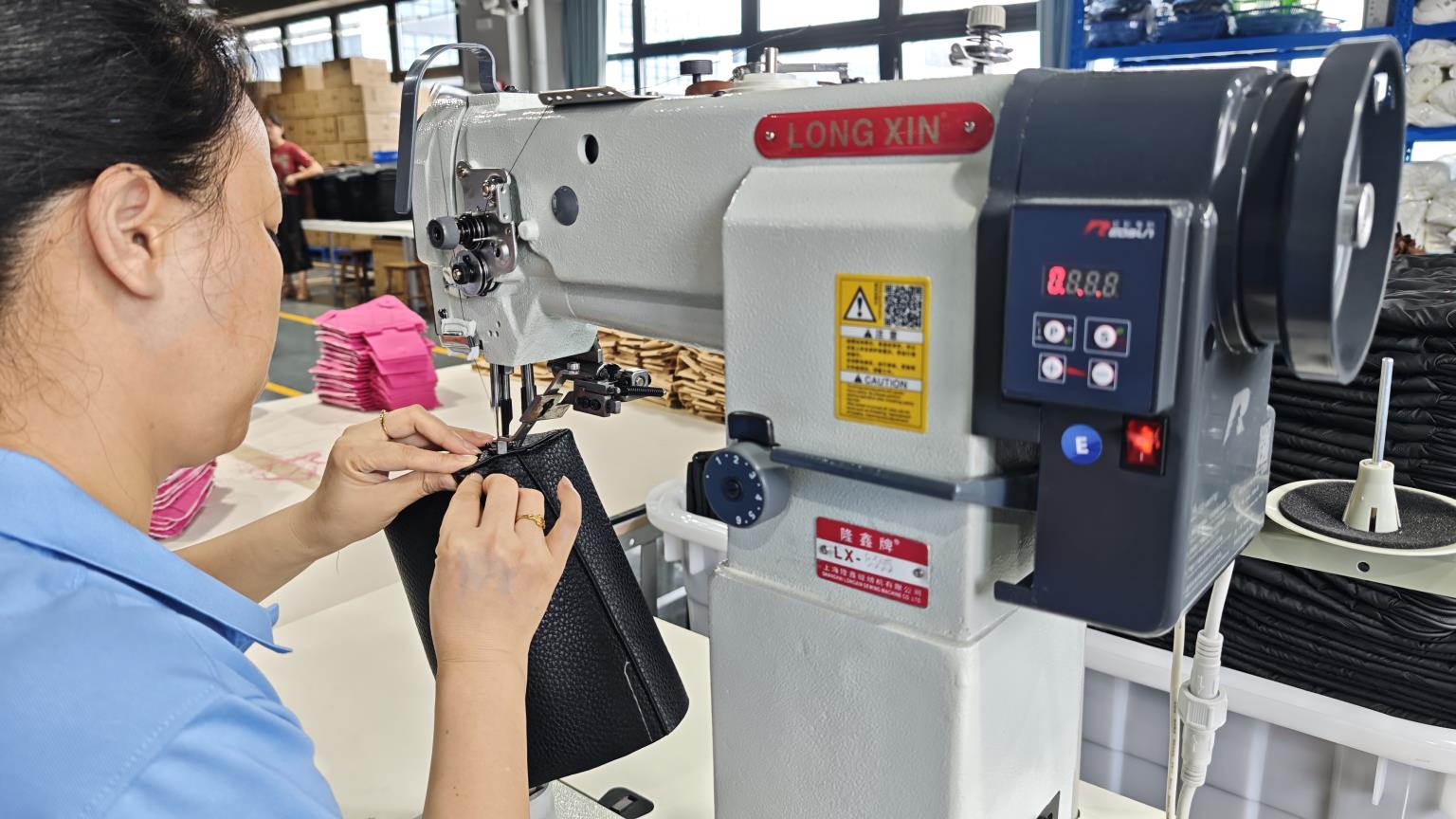 Professional sewing process for fashion bags at Ripped Fashion Co. Ltd China