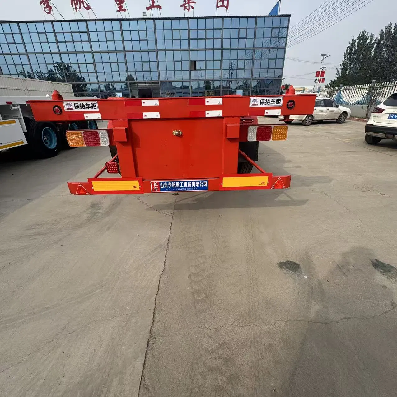 Red Container-Specific Transport Semi-Trailer, with Three-Axle Configuration, Reliable Performance, Meets The Large-Scale Transportation Demands of Containerize