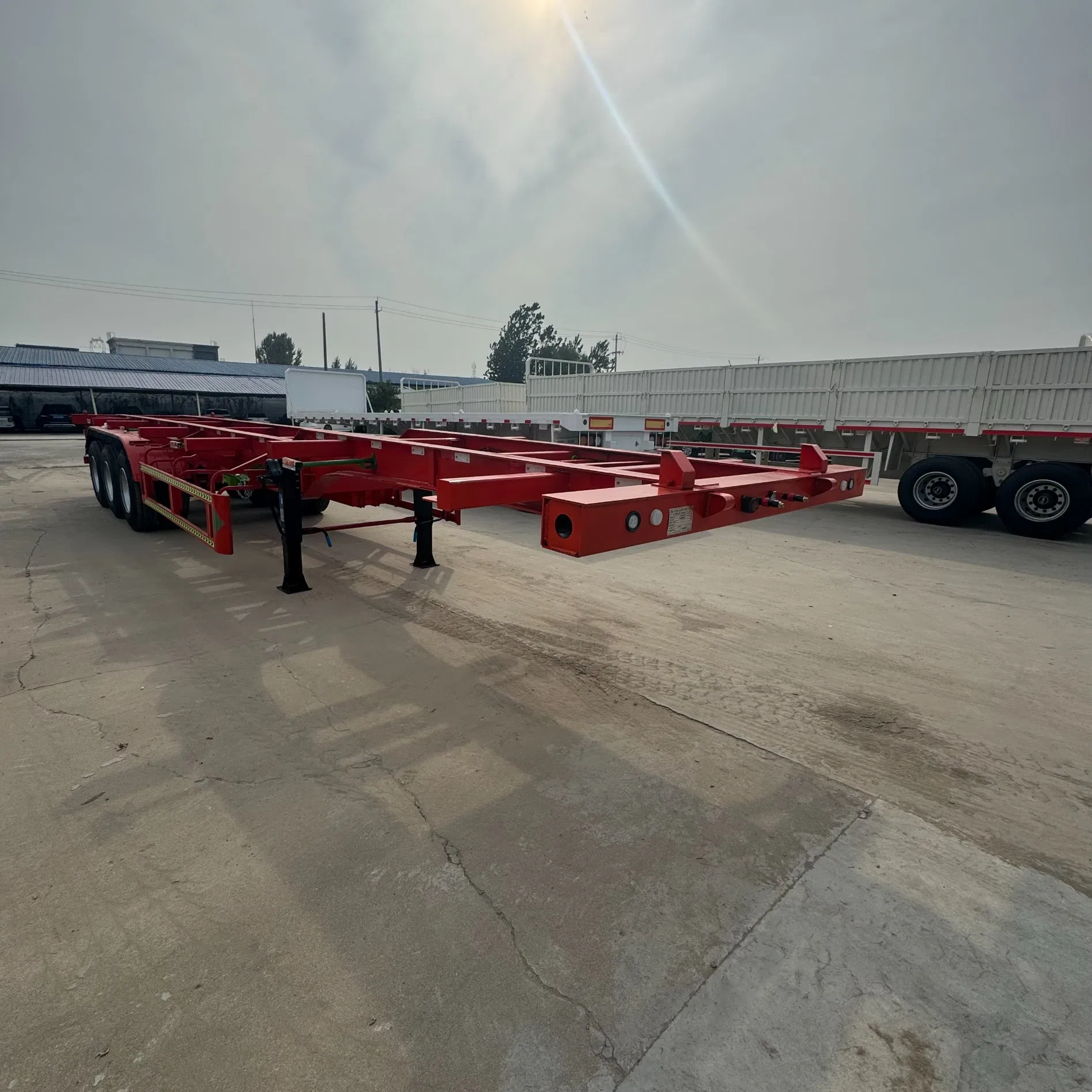 Multi-Wheeled Container Transport Semitrailer, with a Red Appearance and Solid Structure, Is Suitable for Transporting All Kinds of Container Goods, Facilitati