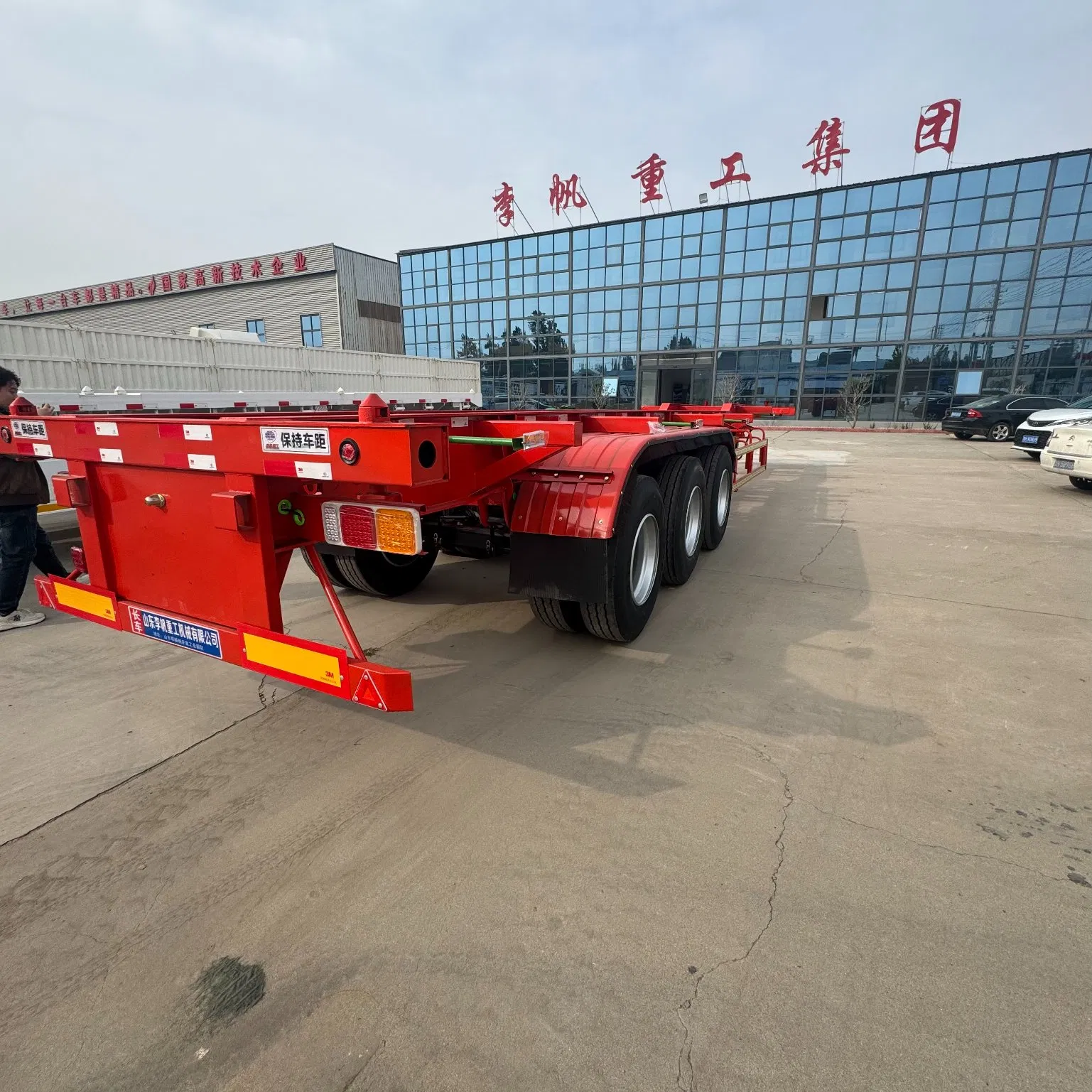 Red Container-Specific Transport Semi-Trailer, with Three-Axle Configuration, Reliable Performance, Meets The Large-Scale Transportation Demands of Containerize