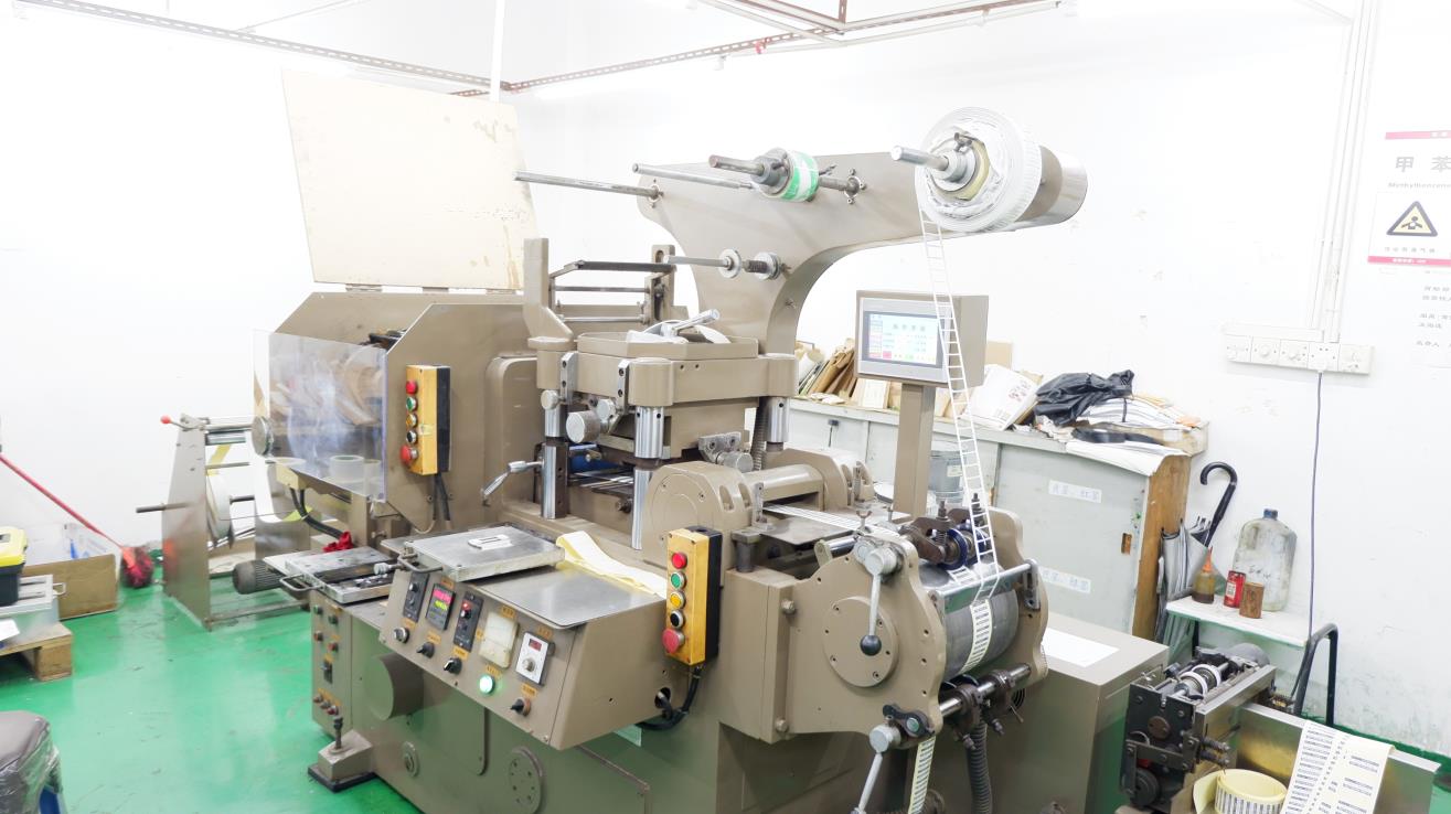 Trademark die cutting machine for precision label and packaging production