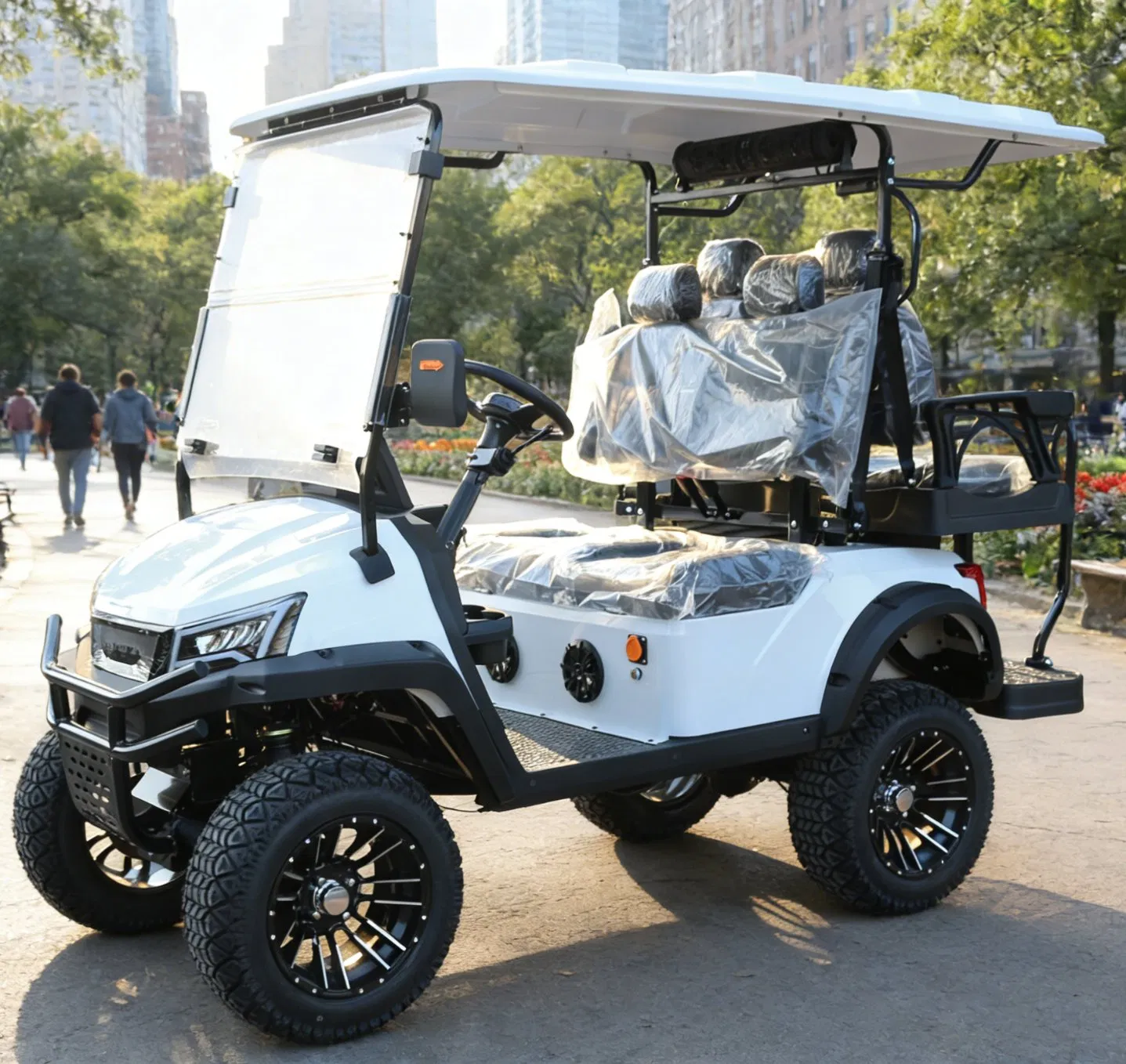 White 4-Seat Golf Cart with Rear Storage for Ski Resort Shuttles