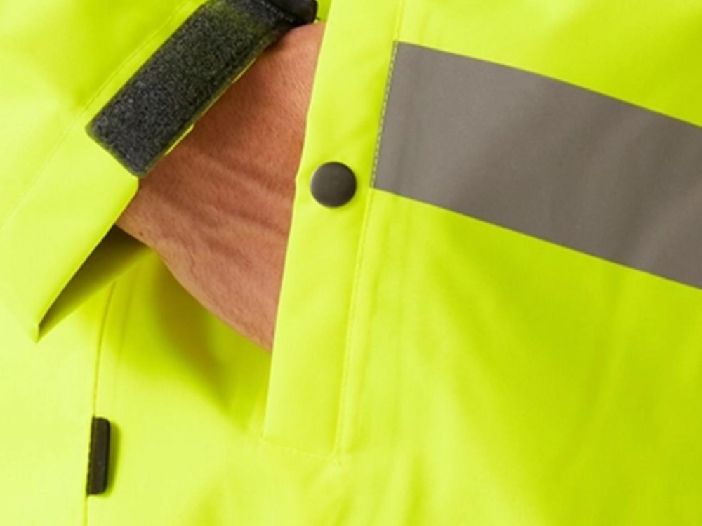 Adjustable Cuffs & Snap-Secured Pocket
