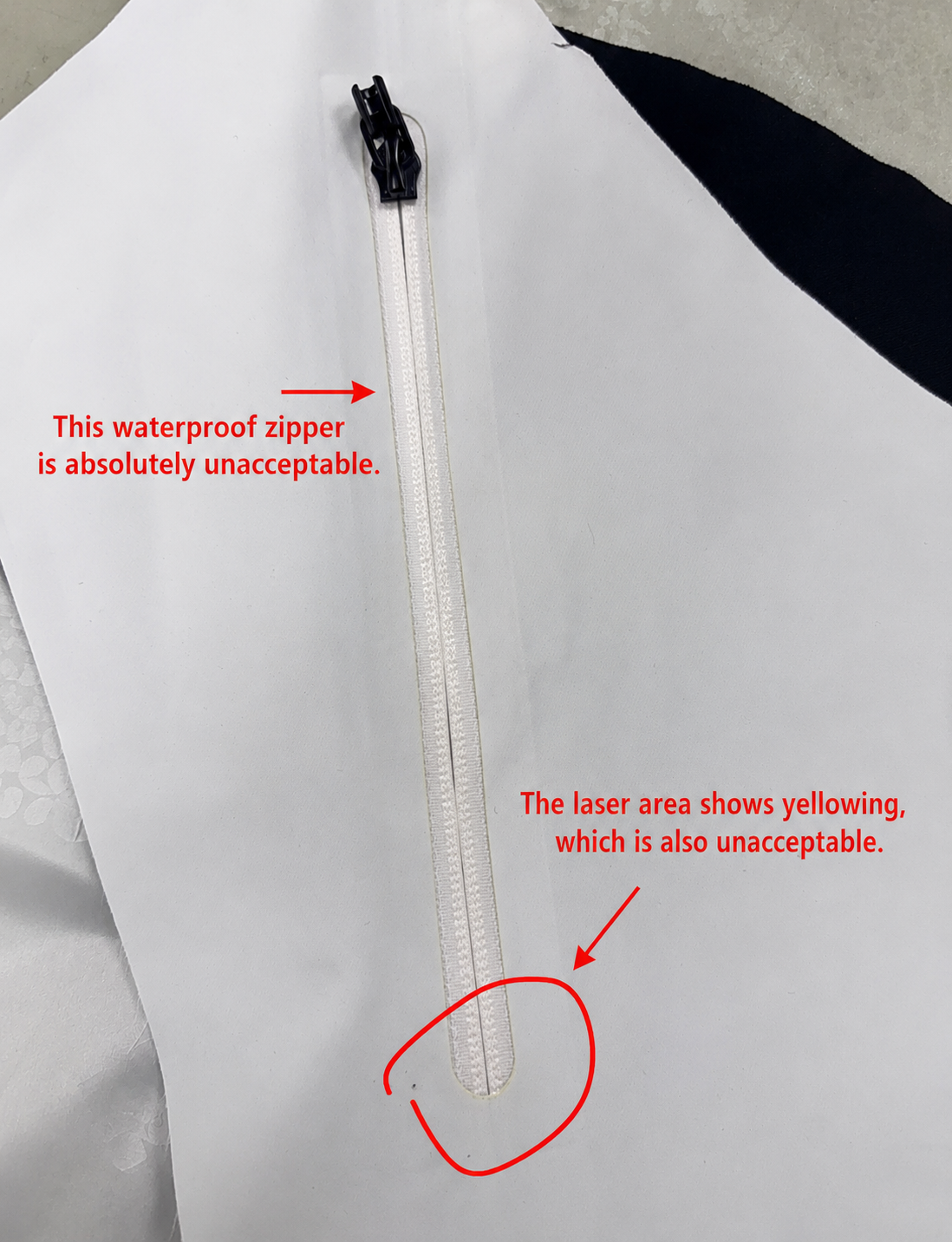 Waterproof zipper yellowing and laser mark defect analysis case study