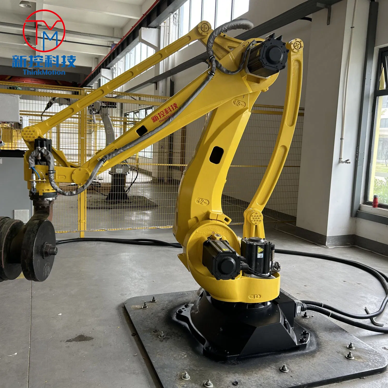 a Multi-Functional Automatic Four-Axis Robotic Arm for Efficient Metal Cutting and Welding