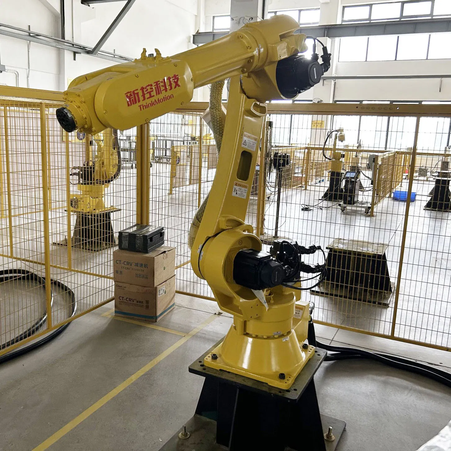 an Electric Industrial Robotic Arm for Automated Welding of Metal Parts