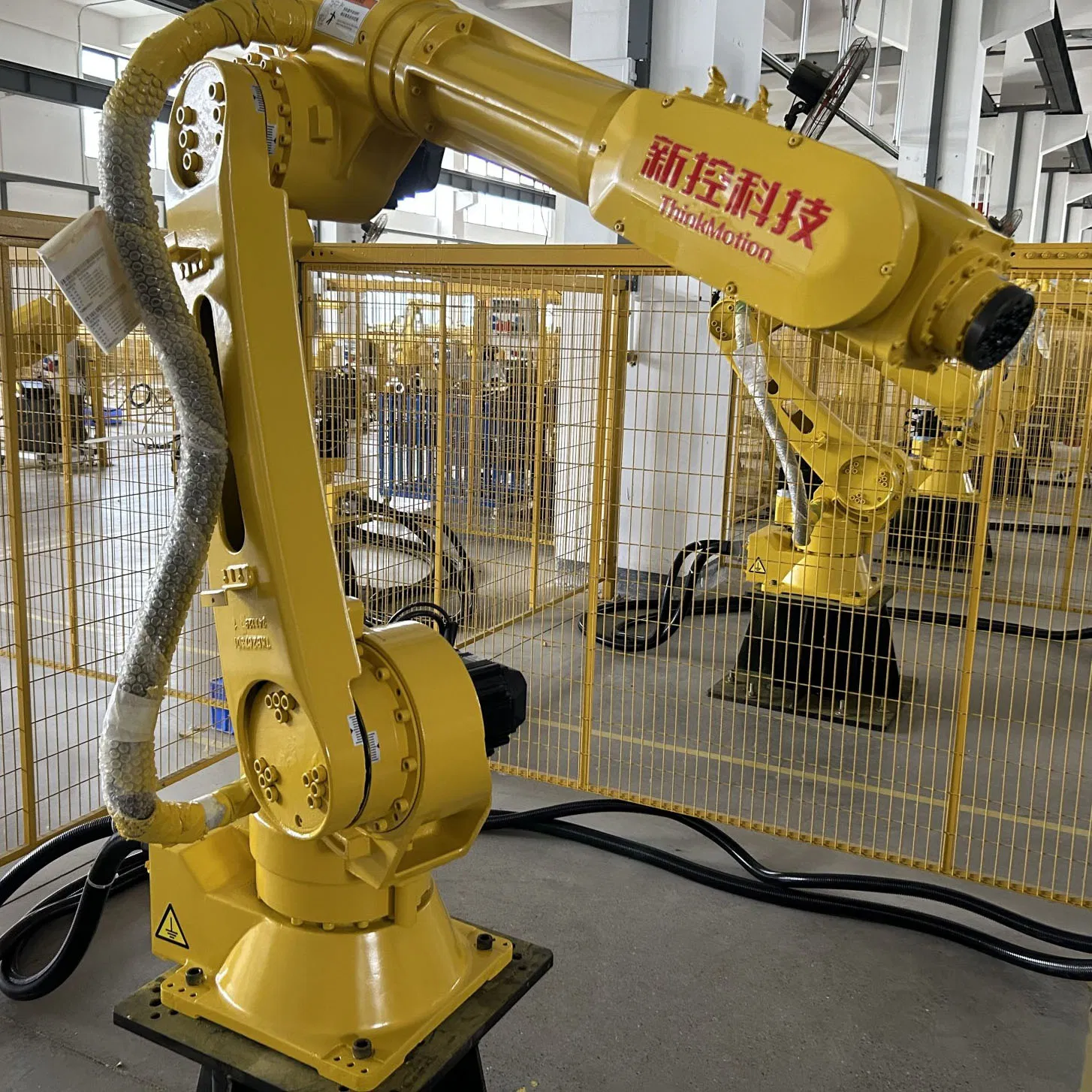 an Electric Industrial Robotic Arm for Automated Welding of Metal Parts