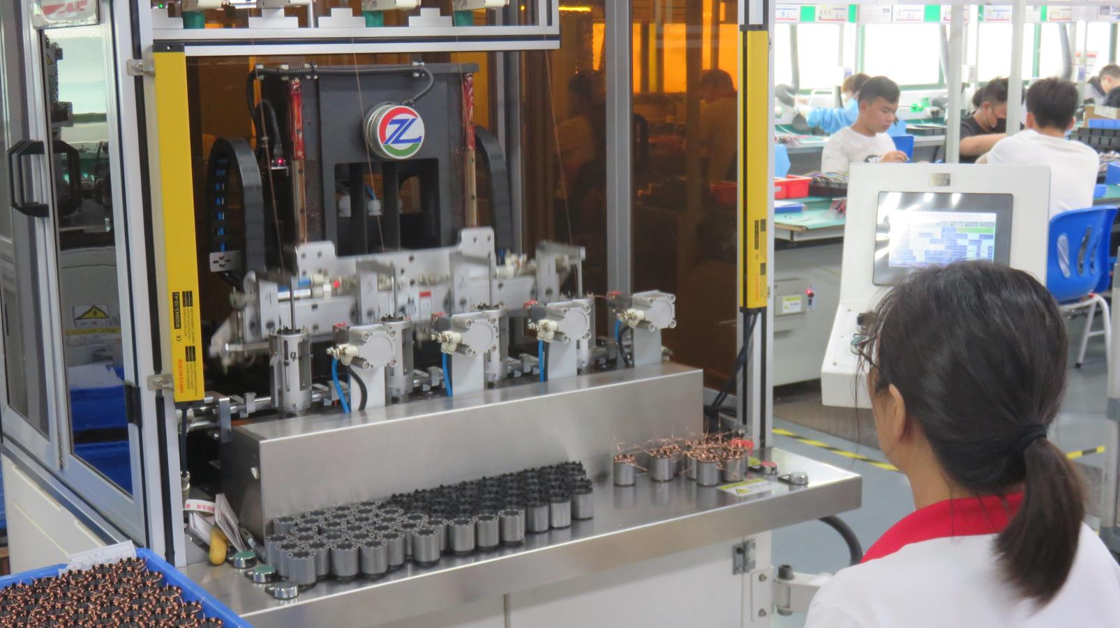 Automatic winding machine for motor coil production