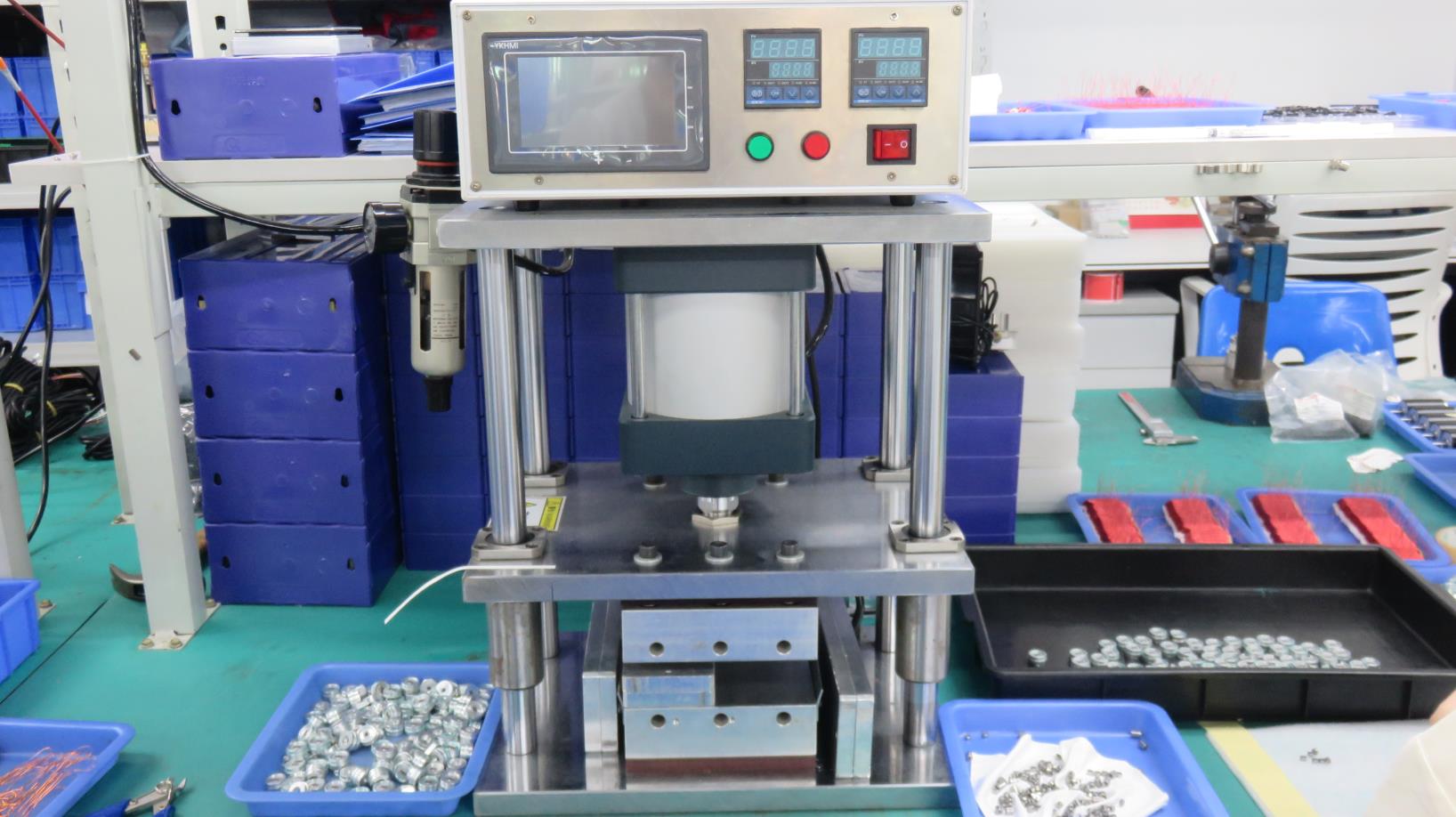 Hot press machine for motor component bonding