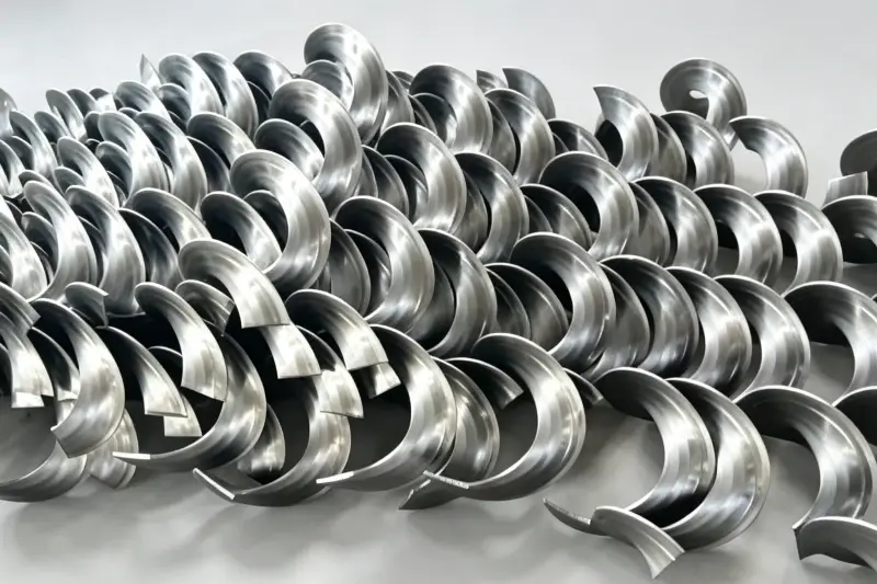 Custom One-Time Formed Cold-Rolled Screw Flight | Harvester Auger Blade Products, Service