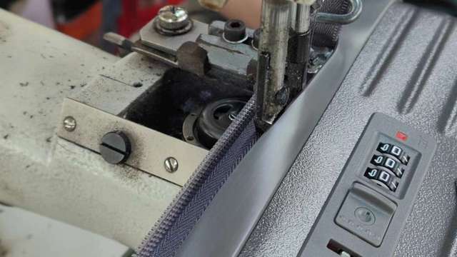 ESRT Life production floor showing sewing lines and assembly stations for travel bag manufacturing